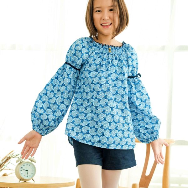Smocks collar blouse in liberty king blue cotton, puffy sleeves, smock collar of the children's fashion brand LA FAUTE A VOLTAIRE