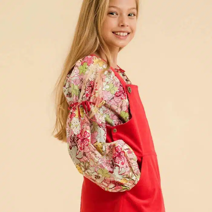 Blouse with smocked collar in red, yellow and green floral liberty cotton, puffed sleeves, smocked collar from the children's fashion brand LA FAUTE A VOLTAIRE