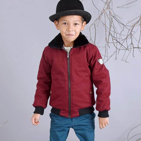 Red burgundy quilted cotton inter-season aviator jacket with pockets, zipper and black faux fur lining for boys 2 to 12 years. La Faute à Voltaire, French designer brand for children in fair trade.