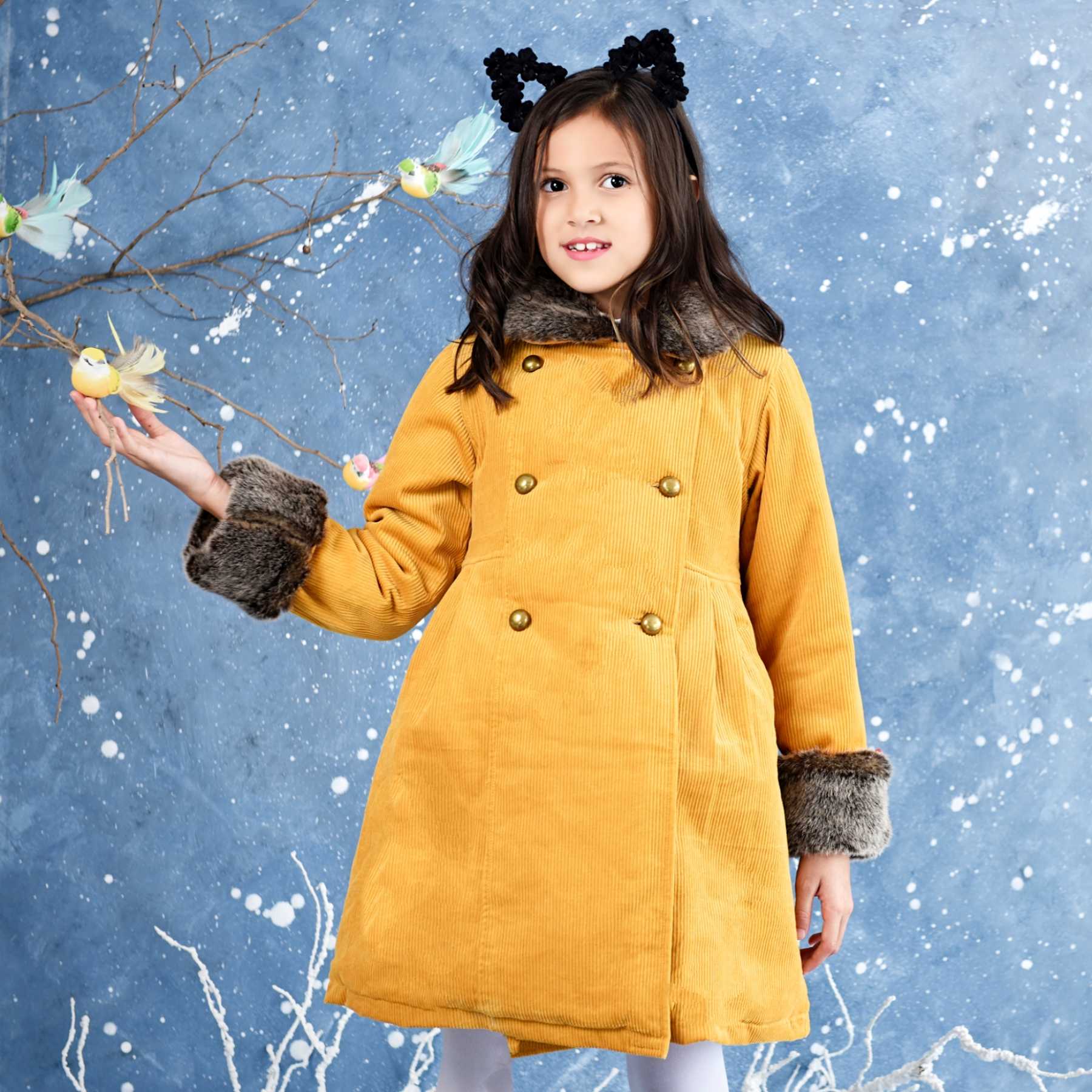 Yellow velvet coat with brown taupe faux fur collar for girls and young women from the children's fashion brand LA FAUTE A VOLTAIRE