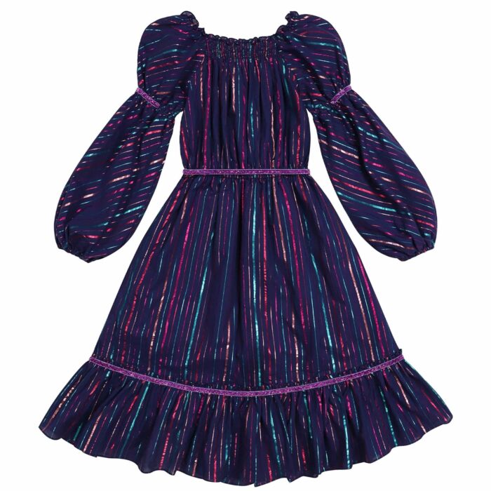 Long evening dress for little girls in indigo blue cotton with fine stripes multicolored sequins pink, green, purple. Smocked collar and long puffed sleeves with elastic cuffs. Ruffles at the bottom of the dress. Purple sequin ribbon details at the bottom of the dress. Purple belt with removable sequins, elastic waist. Fashion brand for children LA FAUTE A VOLTAIRE