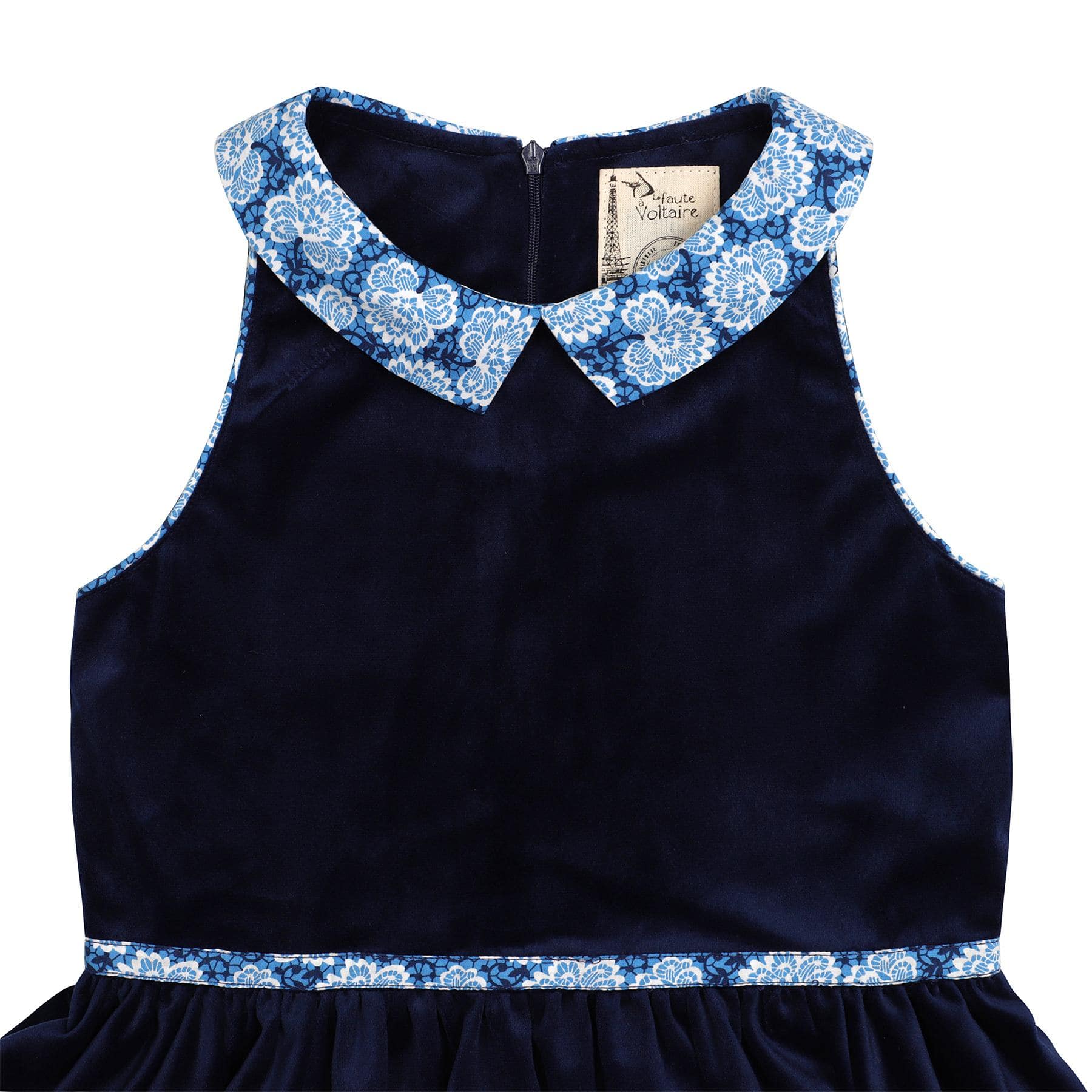 Girl's spinning dress in navy blue velvet and royal blue floral Claudine collar from the children's fashion brand LA FAUTE A VOLTAIRE