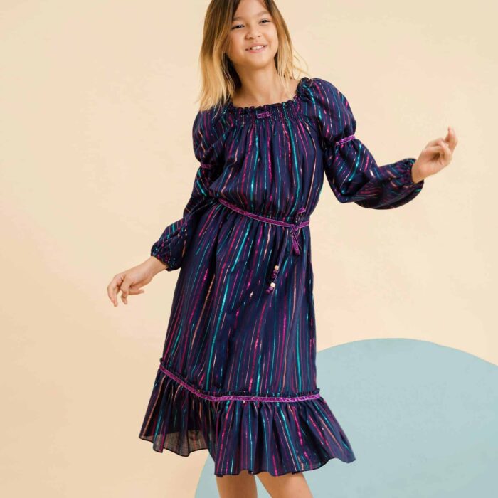 Purple girl's long evening dress with fine sequin stripes, puffed sleeves, ruffles, smocked collar from the children's fashion brand La Faute à Voltaire