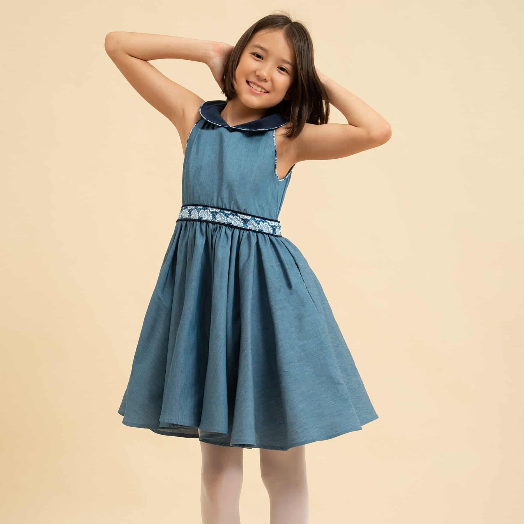 Dress that turns blue denim for girls with. a navy blue velvet Claudine collar from the children's fashion brand la faute a voltaire