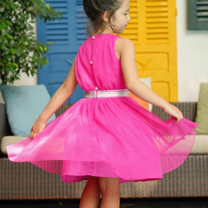 Beautiful fuchsia pink veil dress, which turns, American armhole, silver sequin belt for girls and little princesses. Dress of procession of the fashion brand LA FAUTE A VOLTAIRE