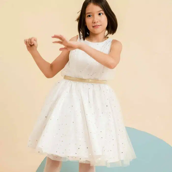 Robe de soirée fille et fillette pour le Nouvel An et toutes les fêtes. En coton et tulle blanche avec paillettes étoiles dorées de la marque de mode pour enfant La Faute à Voltaire