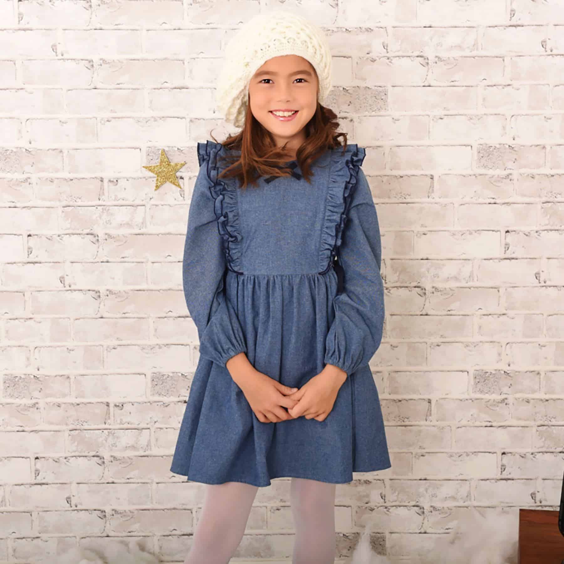 Dark blue denim cotton dress with ruffles and long sleeves for girls from the children's fashion brand LA FAUTE A VOLTAIRE