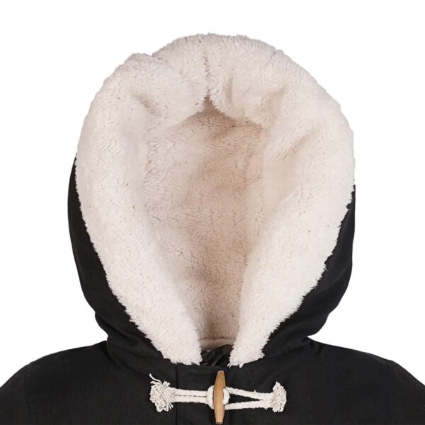 Black cotton winter jacket with white imitation sheep lining, pockets and hood for boys from 2 to 12 years old. La Faute à Voltaire, French designer brand for children in fair trade.