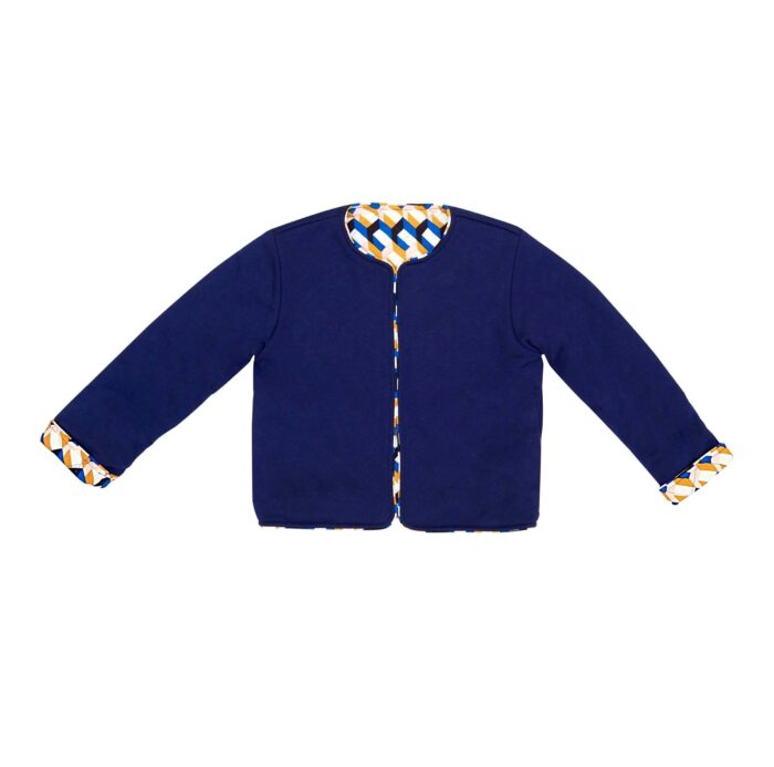 Nice long sleeve jacket in navy blue fleece lined with multicolored cotton with Paris crest on the back. Short jacket for girls from the children's fashion brand LA FAUTE A VOLTAIRE