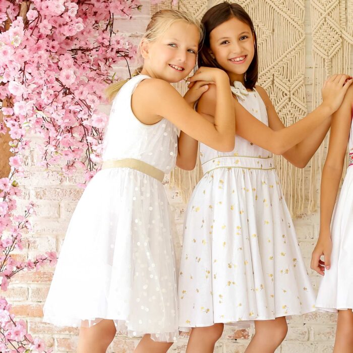 Beautiful formal dresses in beige and gold tulle, linen, cotton liberty. Procession dresses collection for girls and teens from 2 to 16 years old, from the children's fashion brand LA FAUTE A VOLTAIRE