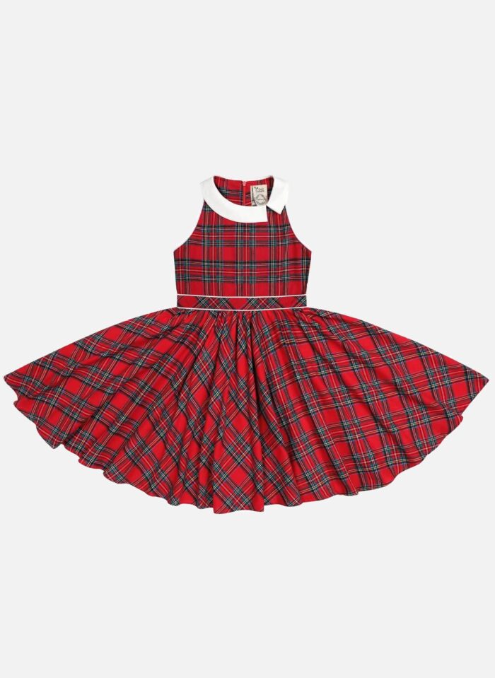 Une élégante robe qui tourne en carreaux tartan rouge pour Noël de la marque de mode vêtements pour enfants La Faute à Voltaire