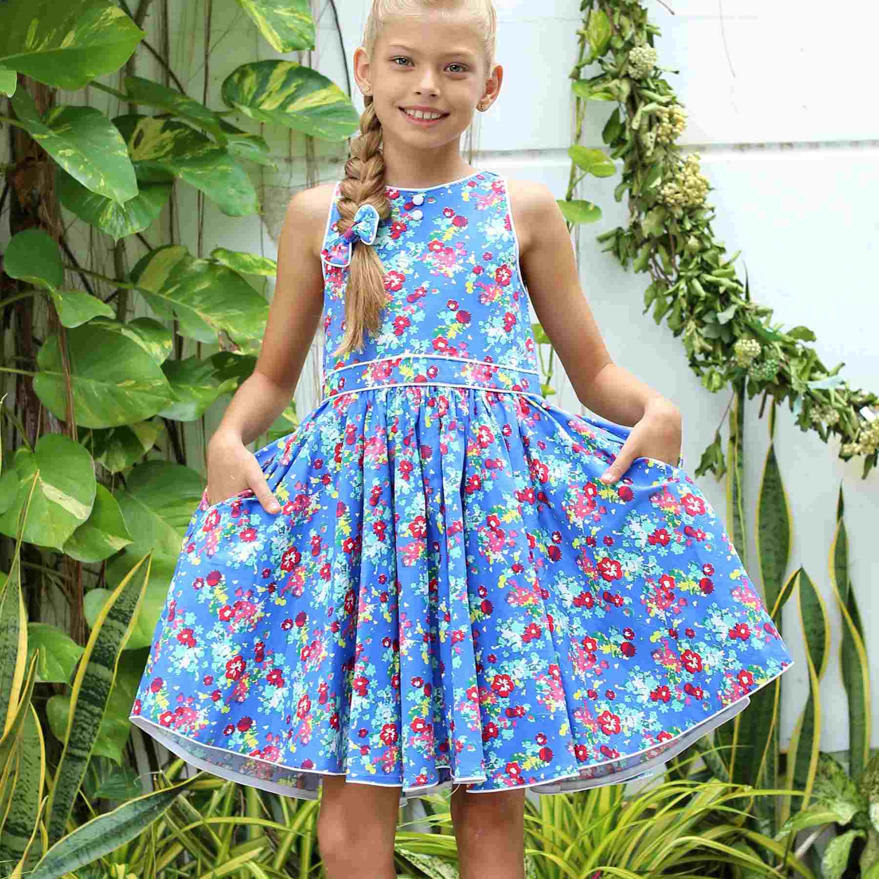 Dress that turns for girl blue flowers pink of the brand of fashion for children LA FAUTE A VOLTAIRE