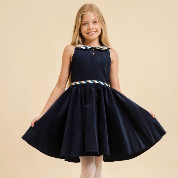 Dress that turns sleeveless in navy blue velvet and claudine collar printed geometric blue king, yellow and pink of the brand creator for children THE FAULT A VOLTAIRE