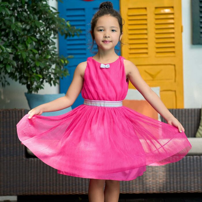 Beautiful fuchsia pink veil dress, which turns, American armhole, silver sequin belt for girls and little princesses. Dress of procession of the fashion brand LA FAUTE A VOLTAIRE