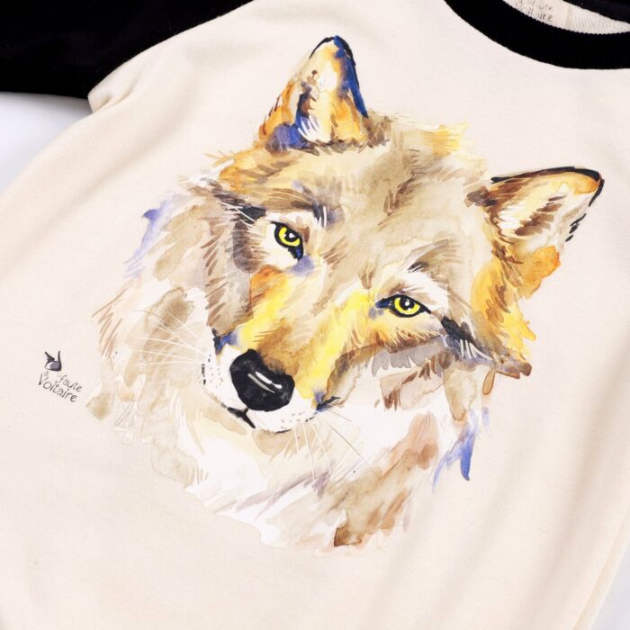 Beau sweat shirt beige et noir avec un bel imprimé d'une peinture à l'eau d'un loup de la marque de mode pour enfants La Faute à Voltaire