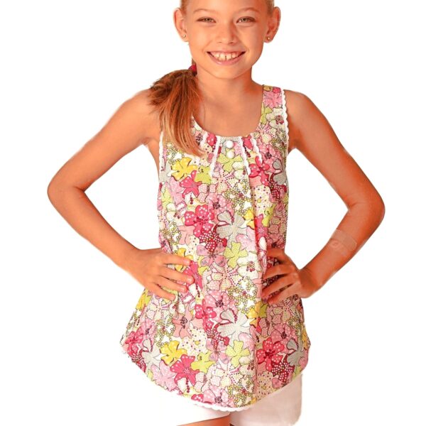 Summer blouse in red, yellow and pink liberty cotton trimmed with fine white lace with crossed straps in the back for girls from 2 to 14 years