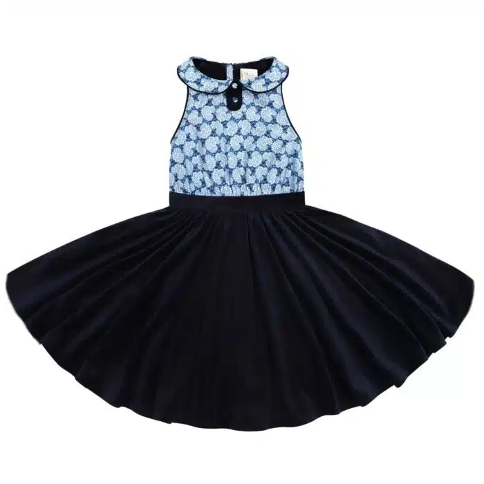Robe qui tourne pour fille et fillette de 2 à 16 ans bi-matières en coton liberty fleuri bleu roi sur le buste et velours milleraies sur la jupe, sans manche, col Claudine fleurie bordé de velours bleu marine. Design de la marque de mode pour enfant rétro chic en commerce équitable LA FAUTE A VOLTAIRE