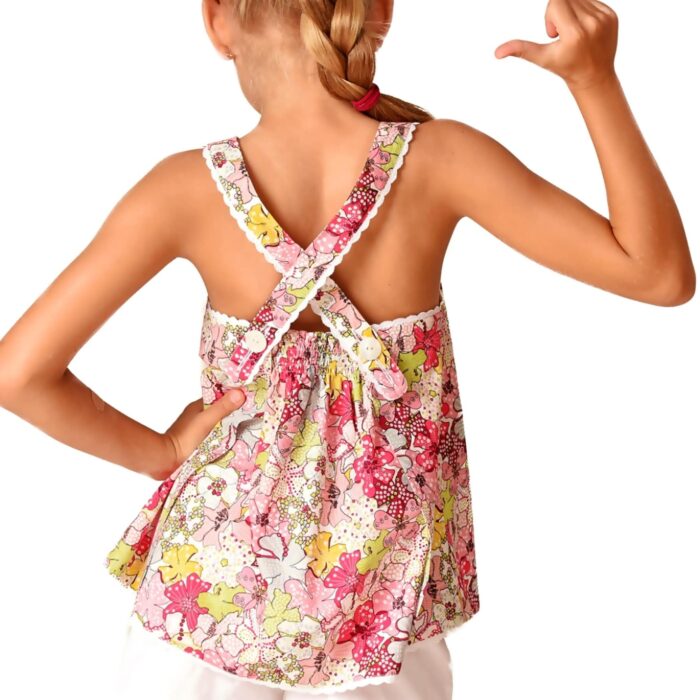 Blouse d'été en coton liberty fleuri rouge, jaune, rose bordé de fine dentelle blanche avec bretelles croisées dans le dos pour filles de 2 à 14 ans