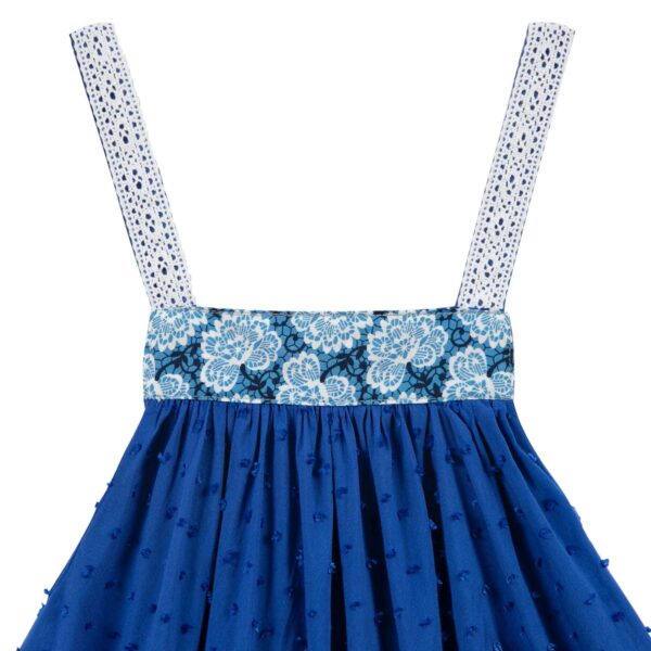 Pretty loose dress for girls in royal blue veil, straps covered with white lace, decorative strip printed blue, white, black with geometric shape. Fashion brand for children and teenagers from 2 to 16 years old, LA FAUTE A VOLTAIRE