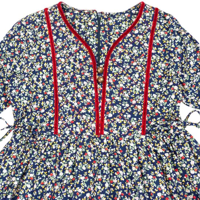 robe intersaison manches longues coton bleu marine fleuri liberty rouge avec plastron avant matelassé et ruban rouge pour petites filles de 2 à 12 ans