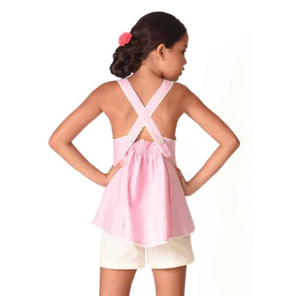 Blouse d'été en coton rose pâle bordé de fine dentelle blanche avec bretelles croisées dans le dos pour filles de 2 à 14 ans