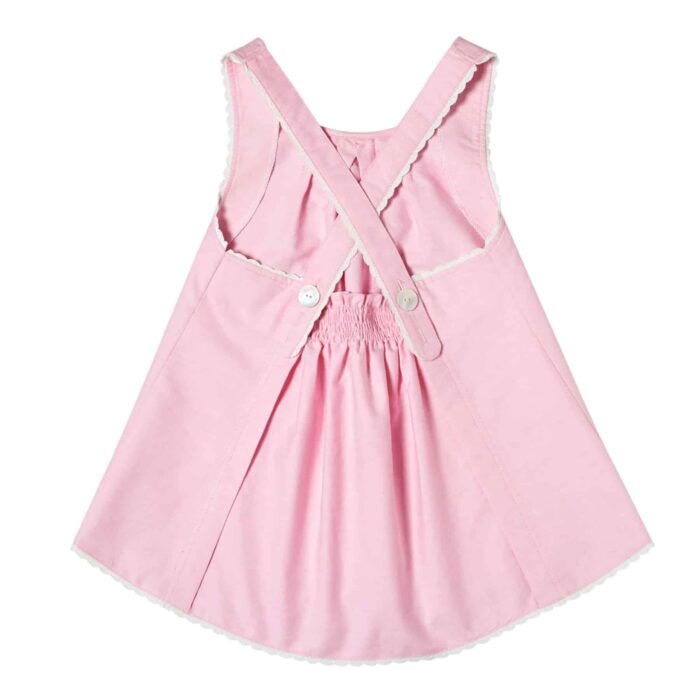 Summer blouse in pale pink cotton with white lace trim and cross back straps for girls 2 to 14 years old