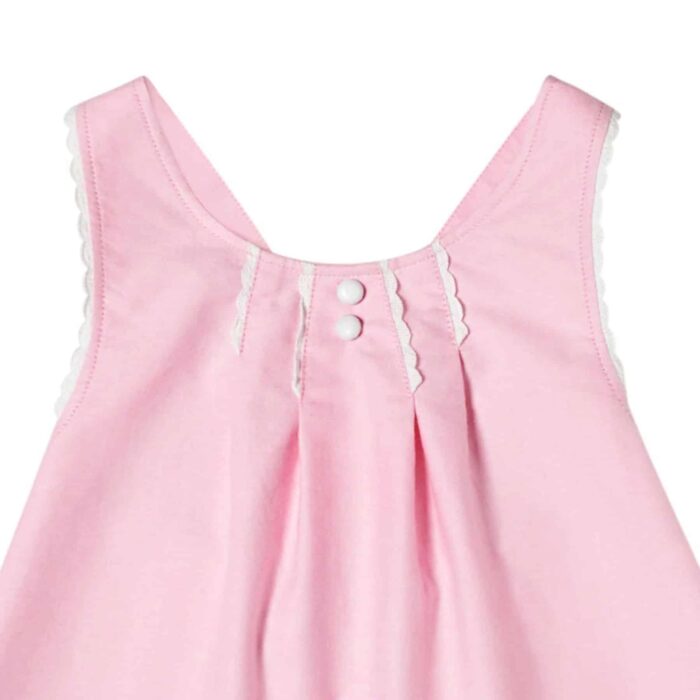 Pastel pink pastel blouse with crossed straps for little girls from the children's fashion brand LA FAUTE A VOLTAIRE