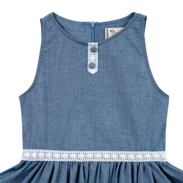 blue denim cotton chambray sleeveless dress with white lace on the collar and belt for little girls and teenagers from 2 to 16 years old from the children's fashion brand LA FAUTE A VOLTAIRE