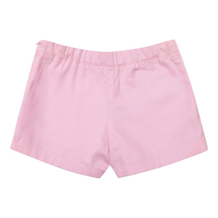 Red sailor shorts for girls with big white buttons. Elegant and trendy shorts for girls from the children's fashion brand LA FAUTE A VOLTAIRE