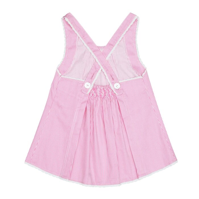 Girl's summer blouse in satin cotton with fine dark pink and white stripes, crossed straps edged with fine white lace from the children's fashion brand LA FAUTE A VOLTAIRE