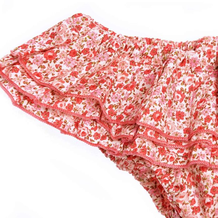Maillot de bain deux pièces à volants avec froufrous en coton fleuri rose et rouge de la marque de mode pour enfant LA FAUTE A VOLTAIRE
