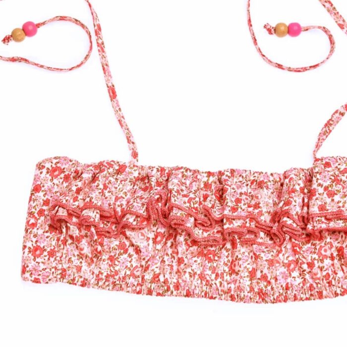 Maillot de bain deux pièces à volants avec froufrous en coton fleuri rose et rouge de la marque de mode pour enfant LA FAUTE A VOLTAIRE