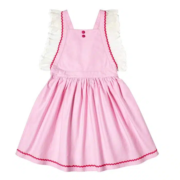 Robe bohème rose pâle à bretelles en fine dentelle beige, dos nu, taille élastique, détaille rose fuchsia de la marque de. mode pour enfants LA FAUTE A VOLTAIRE