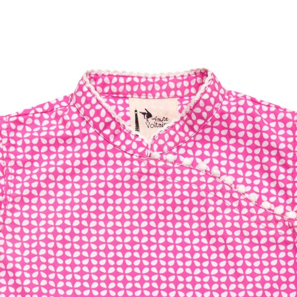 Chinese summer blouse in fuchsia pink and white graphic cotton with Col Mao and short sleeves lined with pompoms for girls 2 to 14 years old