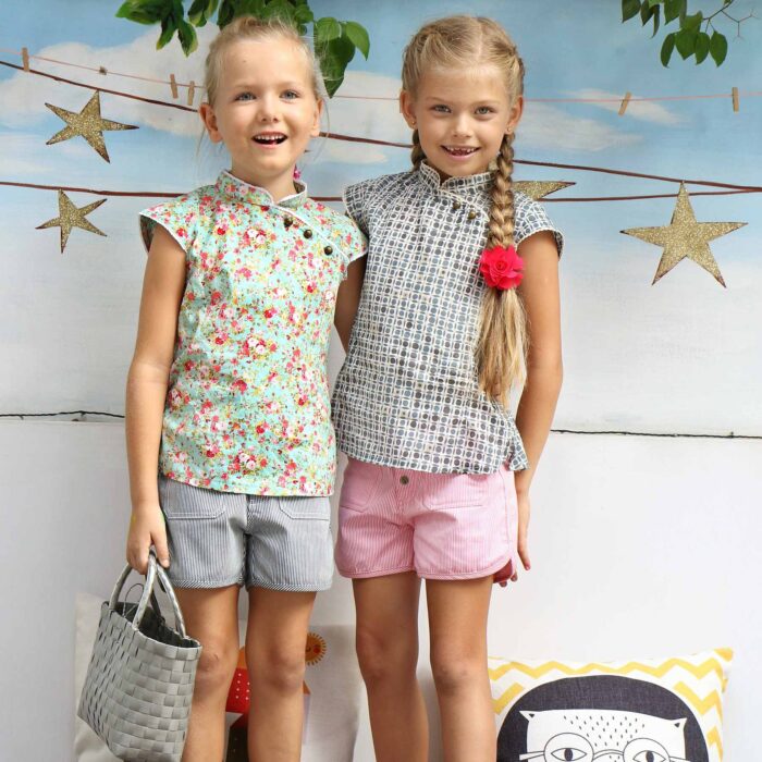 short summer girl's cotton denim shorts with thin navy blue and white stripes for little girls from 2 to 12 years