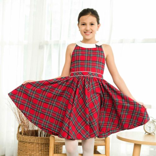 Jolie robe de Noël qui tourne en carreaux tartan rouge et col blanc, sans manche, pour filles et fillettes de la marque de mode pour enfant LA FAUTE A VOLTAIRE