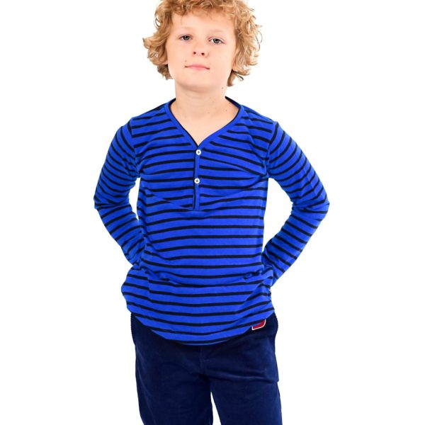 T-shirt in jersey cotton with royal blue and navy blue stripes, long sleeves, V-neck and small white buttons. Creation of the fair trade children's fashion brand LA FAUTE A VOLTAIRE