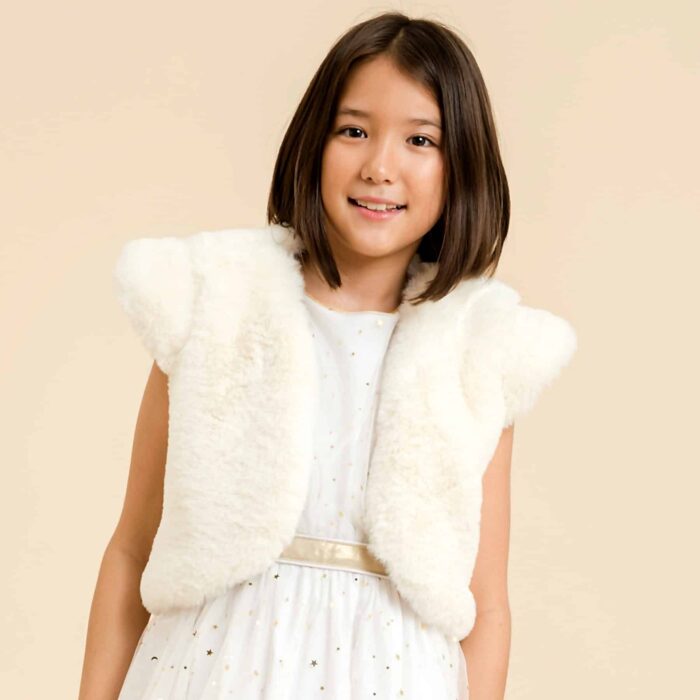 Ceremonial bolero jacket for girls in beige faux fur from the children's fashion brand LA FAUTE A VOLTAIRE.