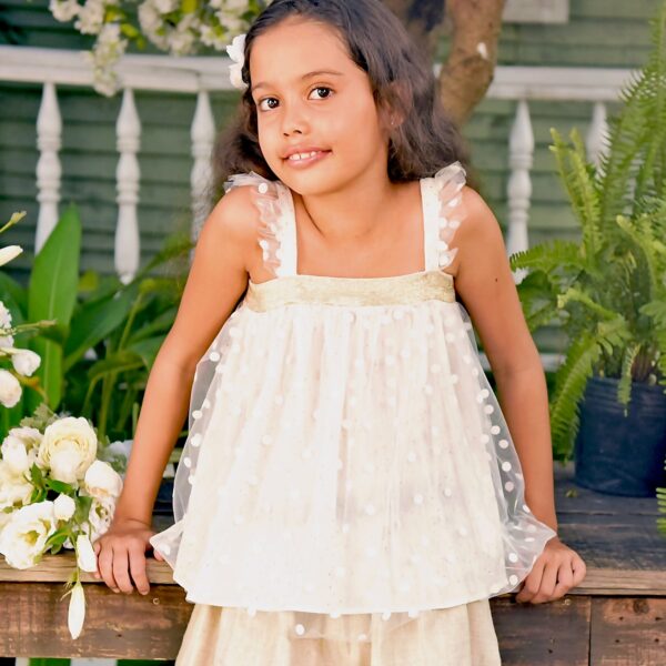 Ceremonial blouse for girls and teens from 2 to 16 years old, made of off-white tulle and gold sequins, white cotton lining, tulle ruffles on the straps, buttoning in the back with bronze button. Fashion designer brand for children produced in fair trade LA FAUTE A VOLTAIRE
