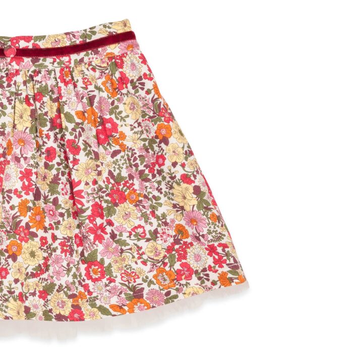 Pretty summer skirt in red liberty floral cotton, with white tulle for girls. Skirt of the fashion brand for children and teenagers LA FAUTE A VOLTAIRE.