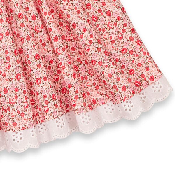 Pretty summer skirt in pink flowered cotton, and embroidery anglaise for girl. Skirt of the fashion brand for children and teenagers LA FAUTE A VOLTAIRE.