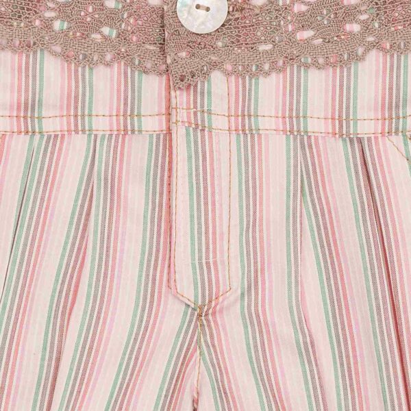 Pretty summer shorts with pink and blue stripes, with beige lace on the waist for girls. Skirt of the fashion brand for children and teenagers LA FAUTE A VOLTAIRE.
