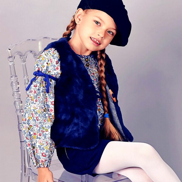 Shepherd's vest in soft blue faux fur for girls from the French fair trade fashion brand LA FAUTE A VOLTAIRE