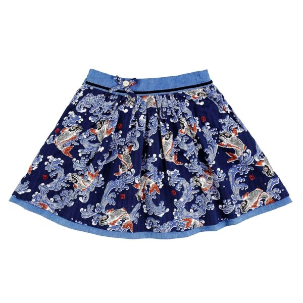 Pretty girls' skirt off-season in blue cotton with Japanese patterns and Khoi fish, lined with pockets and elasticated belt in denim jeans. Lilou skirt model from the fashion brand for children and teenagers LA FAUTE A VOLTAIRE.