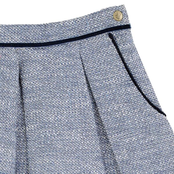 Pretty skirt for girls winter in blue tweed, pockets lined with navy blue velvet borders. LOLA skirt model from the fashion brand for children and teenagers LA FAUTE A VOLTAIRE.
