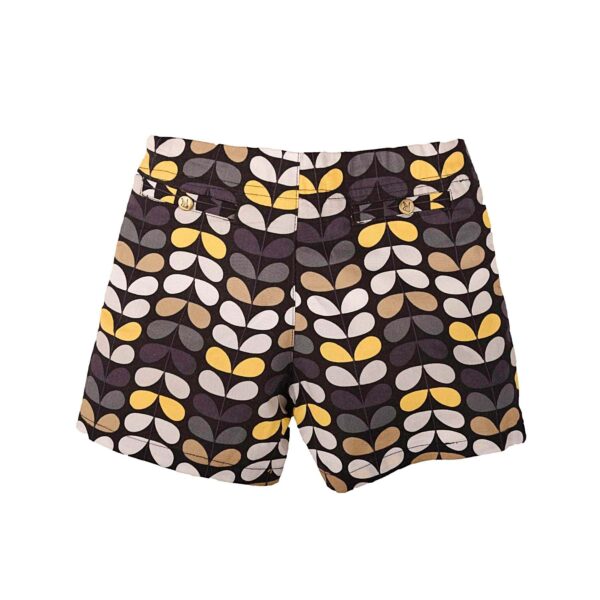 Nice winter shorts for little girl in cotton patterns yellow, gray black, with pockets, and pretty round buttons bronze color. Malice short model of the fashion brand for children and teenagers LA FAUTE A VOLTAIRE.