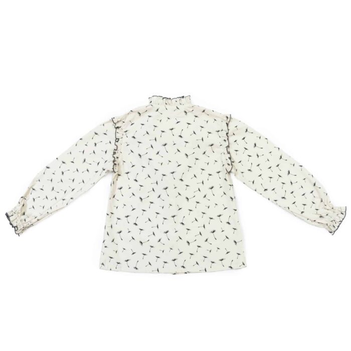 Pretty romantic beige blouse with black flowers, ruffled collar, long sleeves with elastic cuffs from the fashion brand for girls la faute a voltaire