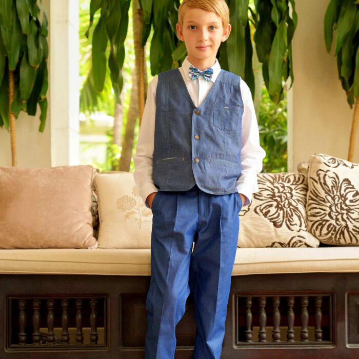 Chic sleeveless suit vest for ceremonies, in denim blue cotton for boys and teens from 2 to 16 years old from the children's fashion brand La Faute à Voltaire