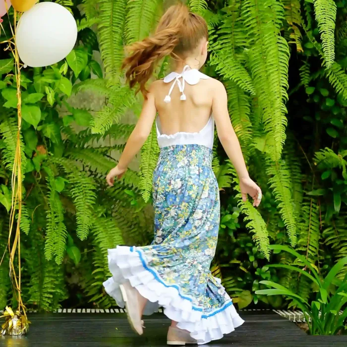 Robe Longue Fleurie Liberty Bleue à la Coupe Midi à Col Smocks qui se Transforme en Un Clin d'Oeil en Jupe bohème longue de la Marque de Mode Française Chic pour Enfants LA FAUTE A VOLTAIRE.