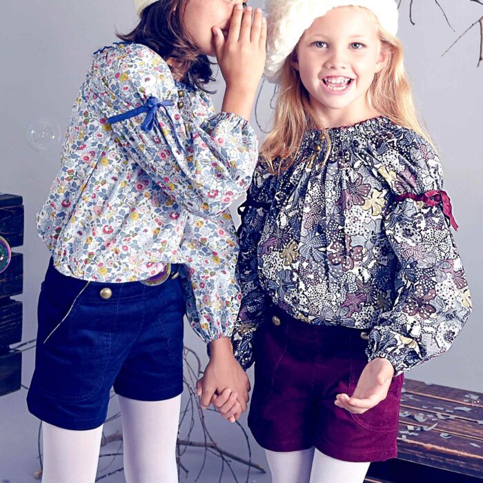 Blouse automne hiver pour fille de 2 à 16 ans en coton fleurie liberty lilas à manche ballon et col smocks de la marque de mode pour enfants en commerce équitable LA FAUTE A VOLTAIRE